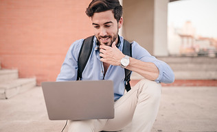 man-sitting-staircase-using-laptop.jpg
